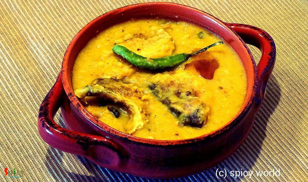 Macher Muro die Muger Daal (Fish head cooked with spicy lentil soup)